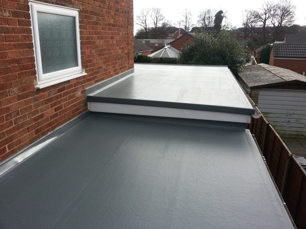 A rubber flat roof (EPDM) on a brick home. 